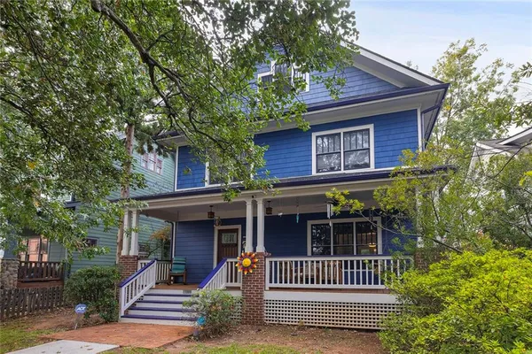 a front view of a house with a porch