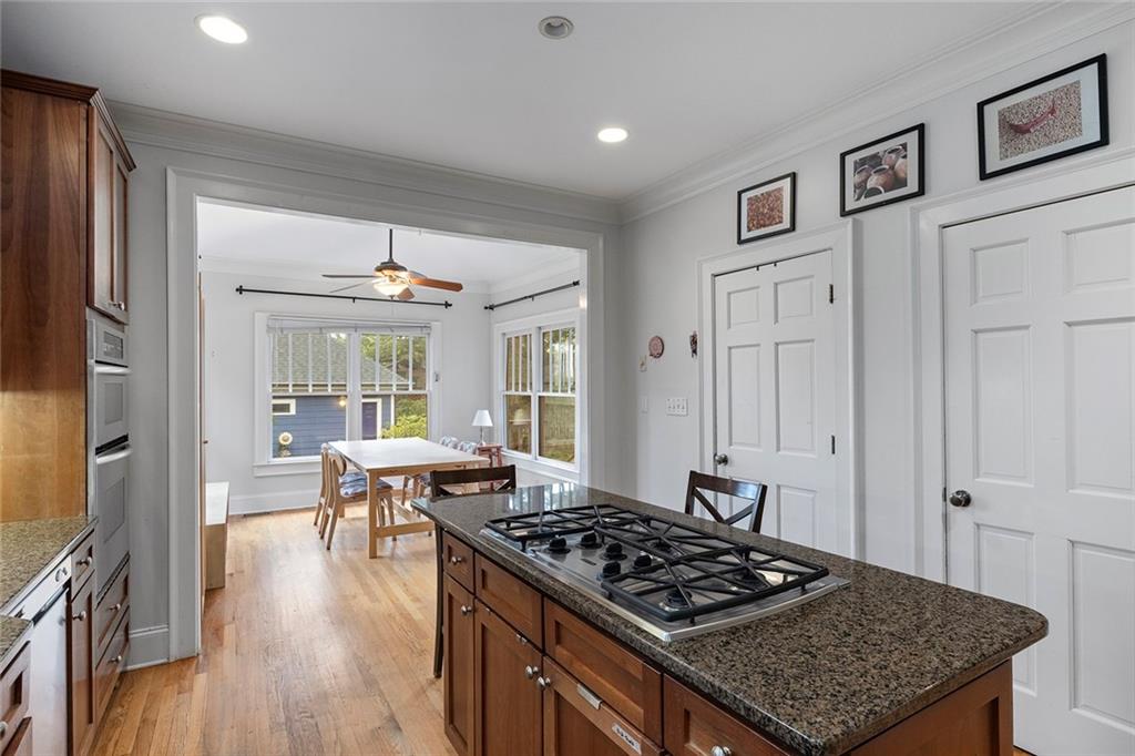 120 Park Place Decatur, GA 30030 - Photo 13 of 35 a kitchen with stainless steel appliances granite countertop a stove and a refrigerator