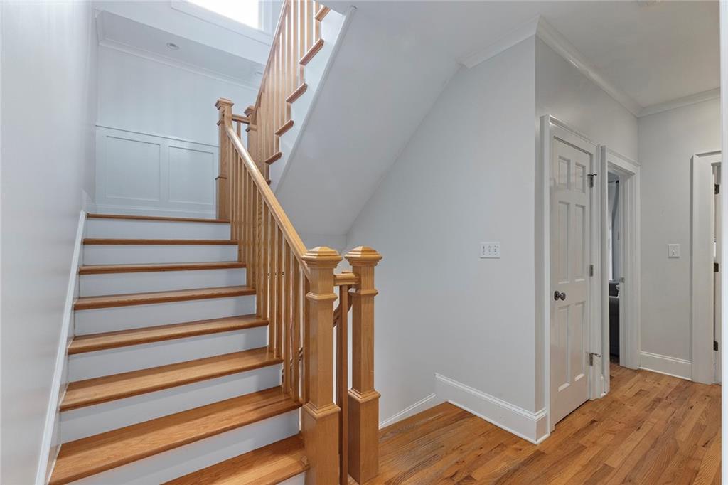 120 Park Place Decatur, GA 30030 - Photo 16 of 35 a view of entryway with wooden floor and stairs