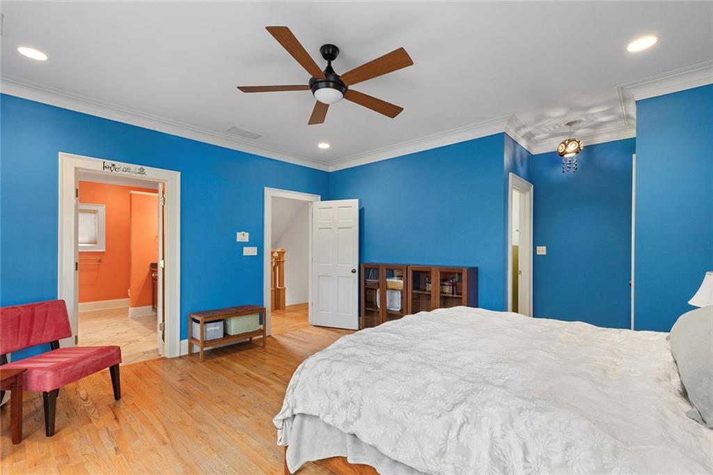 120 Park Place Decatur, GA 30030 - Photo 18 of 35 a bed room with a bed and a ceiling fan