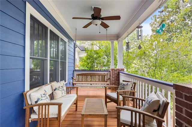 a view of balcony with furniture