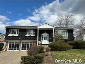 930 Cliffside Avenue Valley Stream, NY 11581 - Photo 1 of 1 a front view of a house with a yard