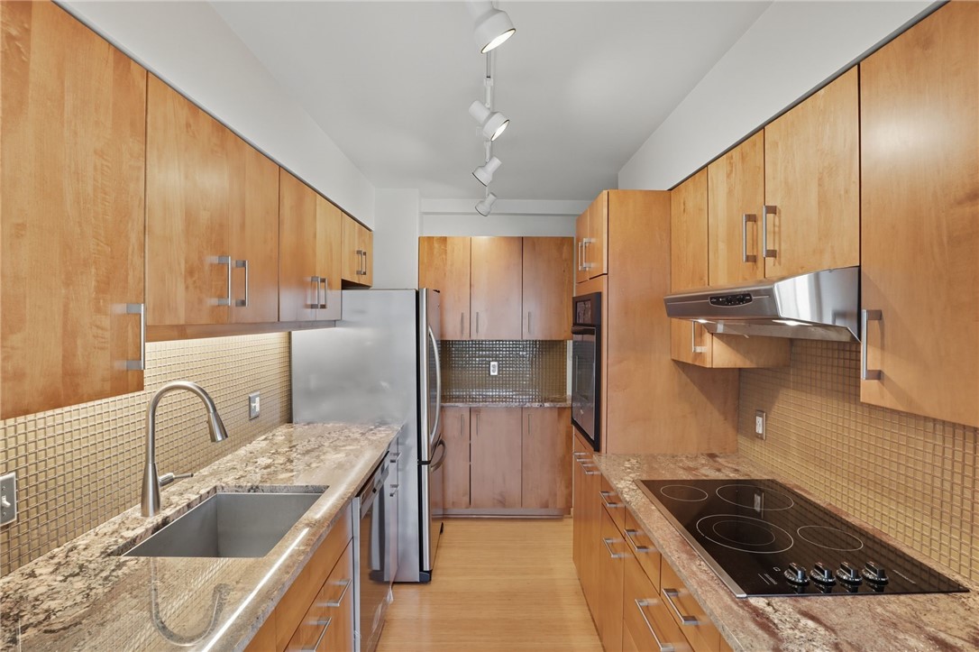 1000 East Avenue, Unit UN606 Rochester, NY 14607 - Photo 8 of 23 * Quartz countertop - beautiful solid wood cabin