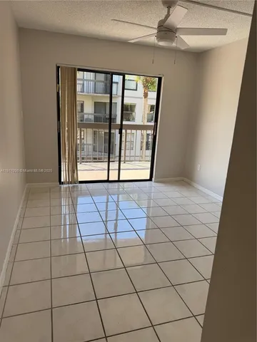 a view of empty room with windows