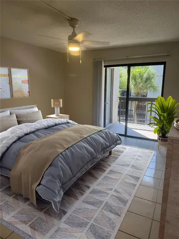 a bedroom with a large bed and a large window