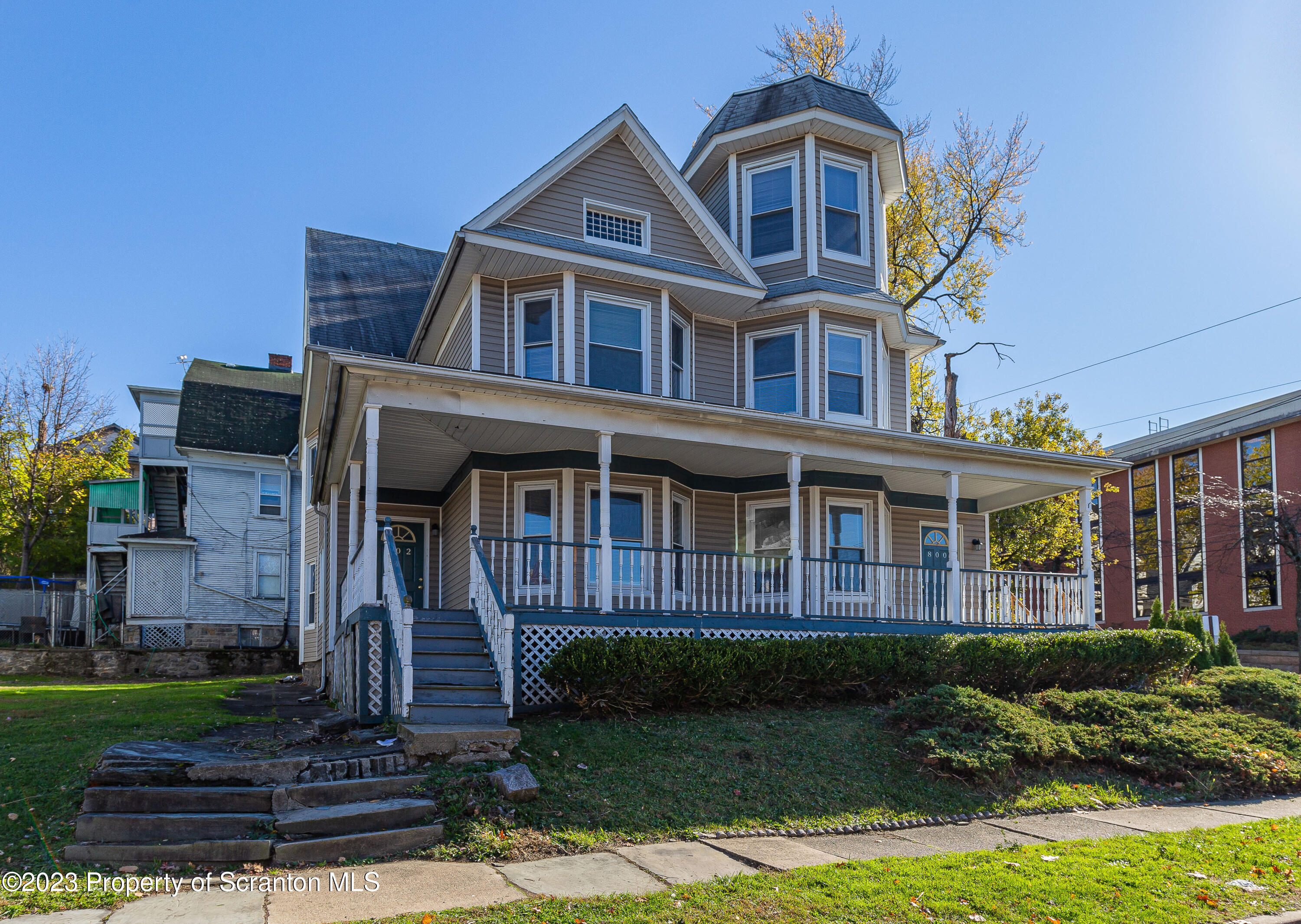 802 Quincy Avenue Scranton, PA 18510 - Photo 1 of 17 a front view of a house with a yard