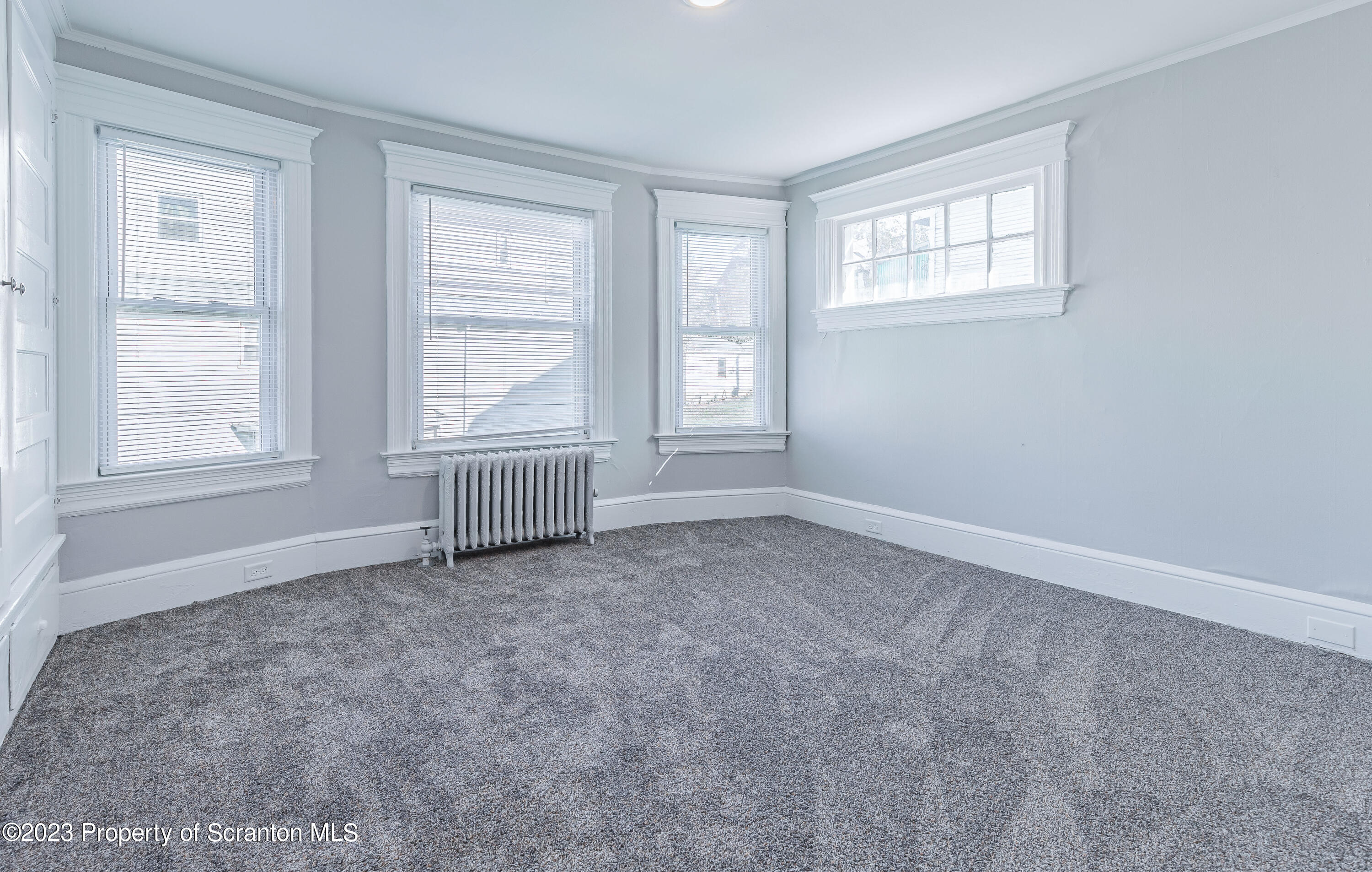 802 Quincy Avenue Scranton, PA 18510 - Photo 12 of 17 an empty room with windows