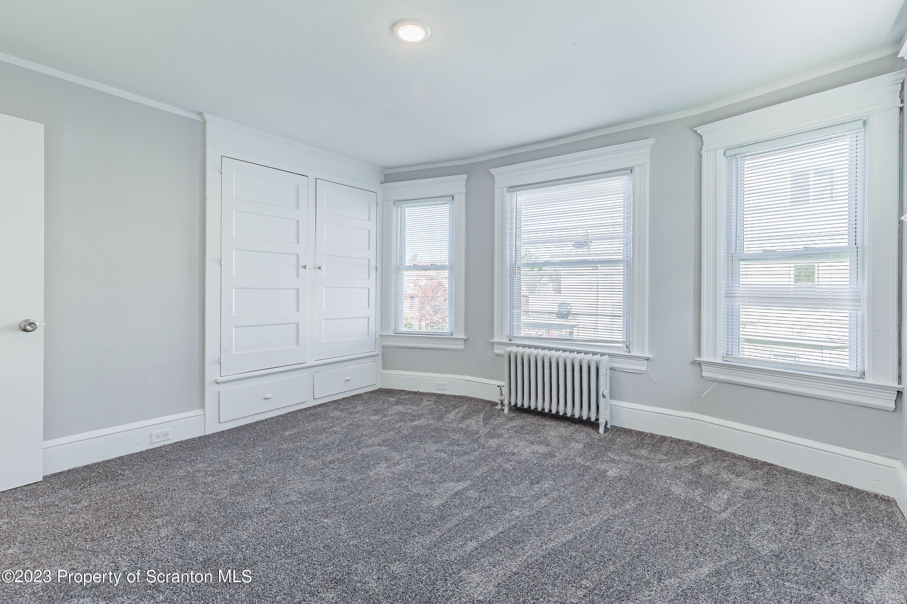 802 Quincy Avenue Scranton, PA 18510 - Photo 13 of 17 a view of an empty room with a window