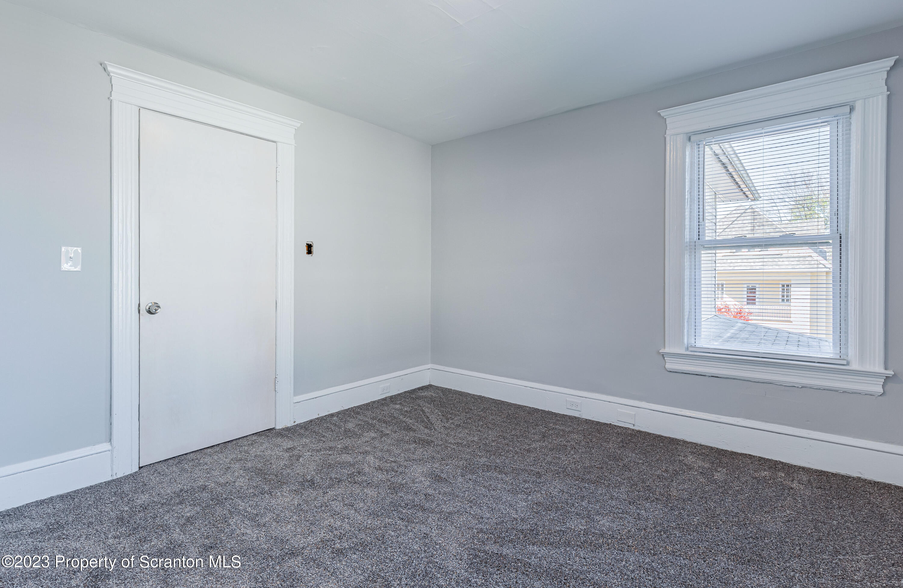 802 Quincy Avenue Scranton, PA 18510 - Photo 14 of 17 an empty room with windows