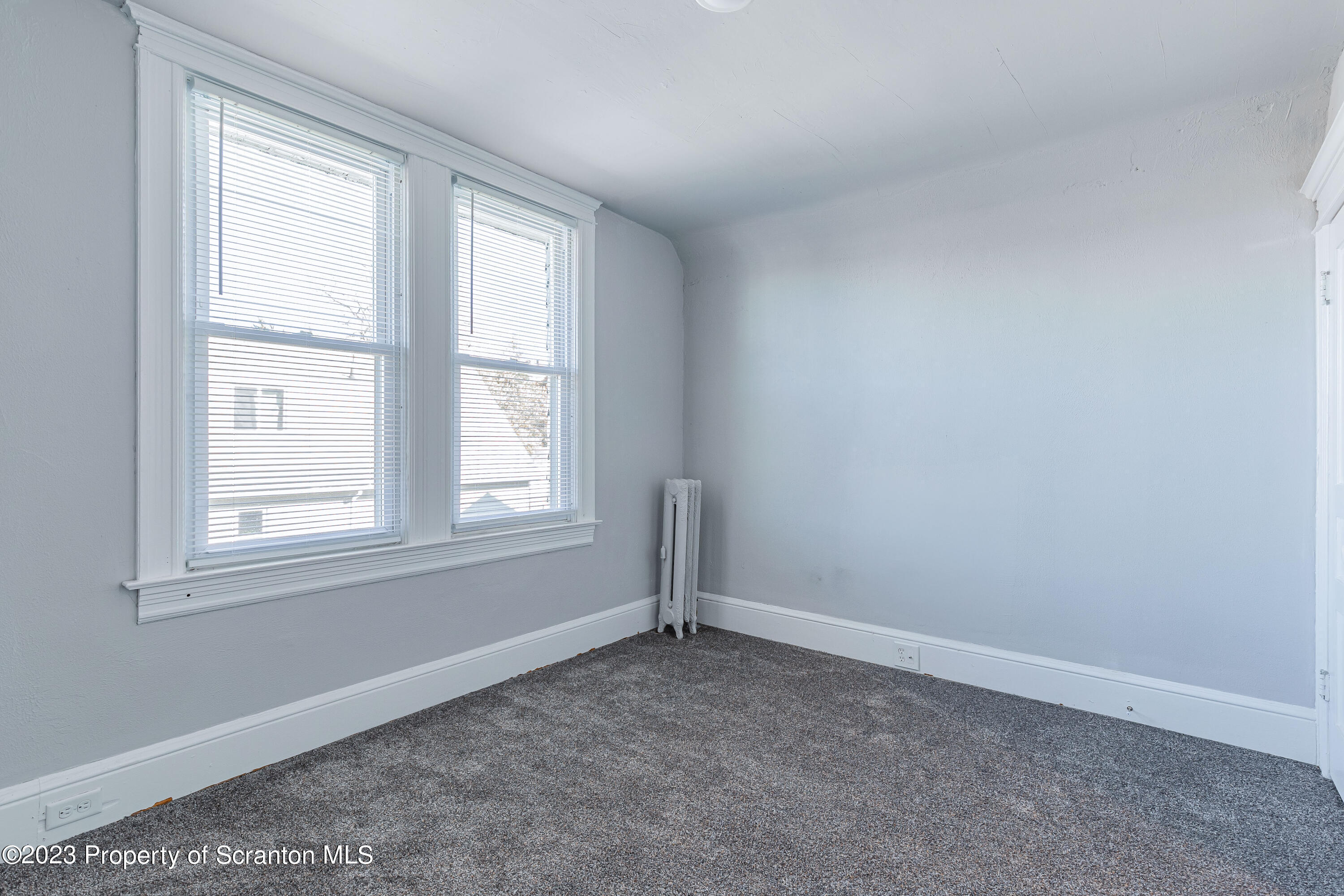 802 Quincy Avenue Scranton, PA 18510 - Photo 15 of 17 an empty room with a window