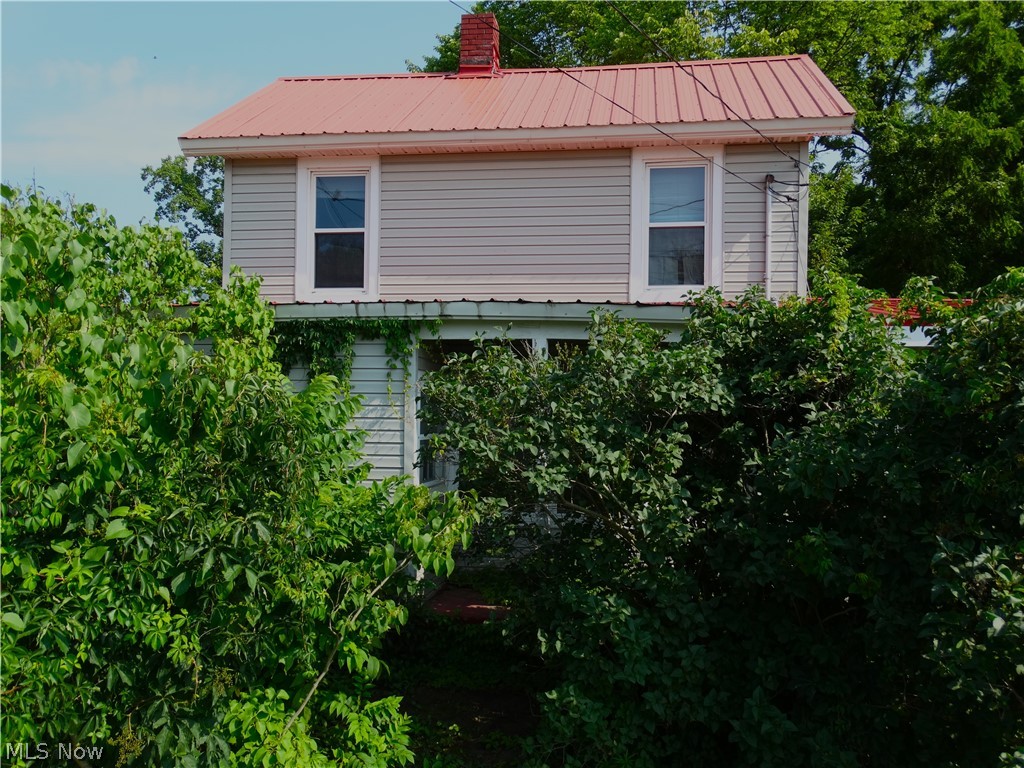7759 North Ridge Road Madison, OH 44057 - Photo 2 of 14 View of side of property