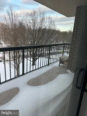 a view of balcony with furniture