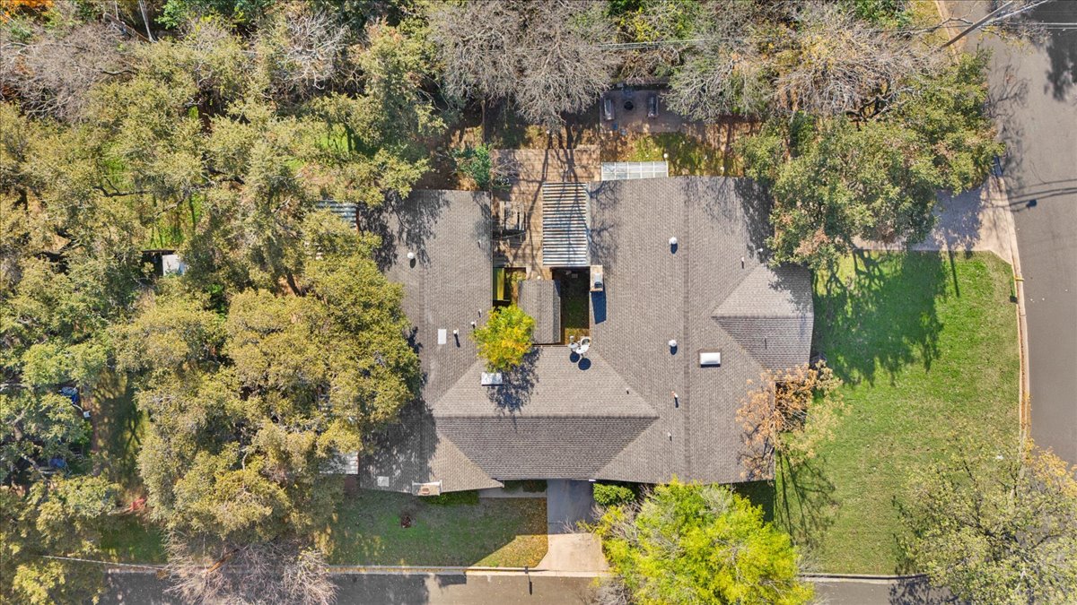8713 Azalea Trail Austin, TX 78759 - Photo 10 of 13 An aerial perspective reveals a private courtyard nestled within the home's roofline.