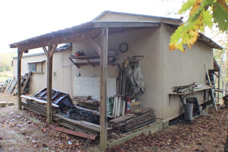 313 Webster Road Mount Airy, NC 27030 - Photo 16 of 29 STORAGE SHED ATTACHED TO WORK SHOP