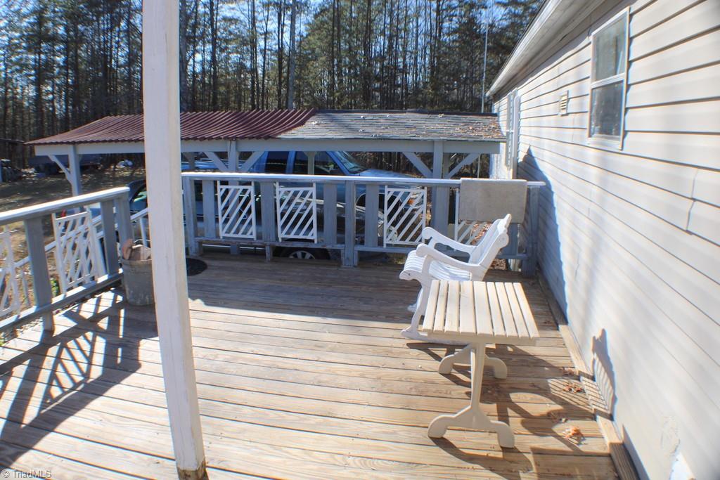 313 Webster Road Mount Airy, NC 27030 - Photo 18 of 29 DECK OVERLOOKING THE SCENIC BACK YARD AREA
