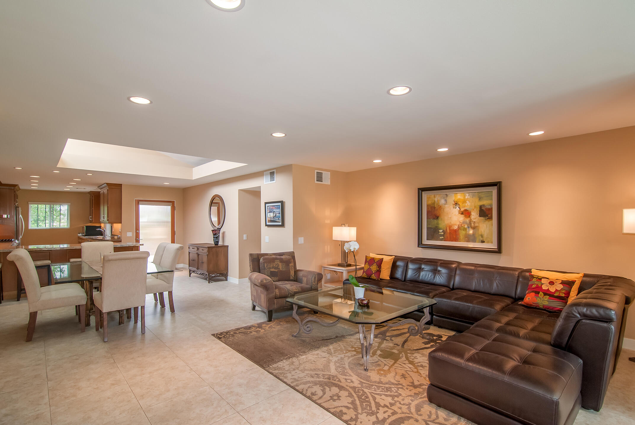 48275 Racquet Lane Palm Desert, CA 92260 - Photo 13 of 29 a living room with furniture and large window