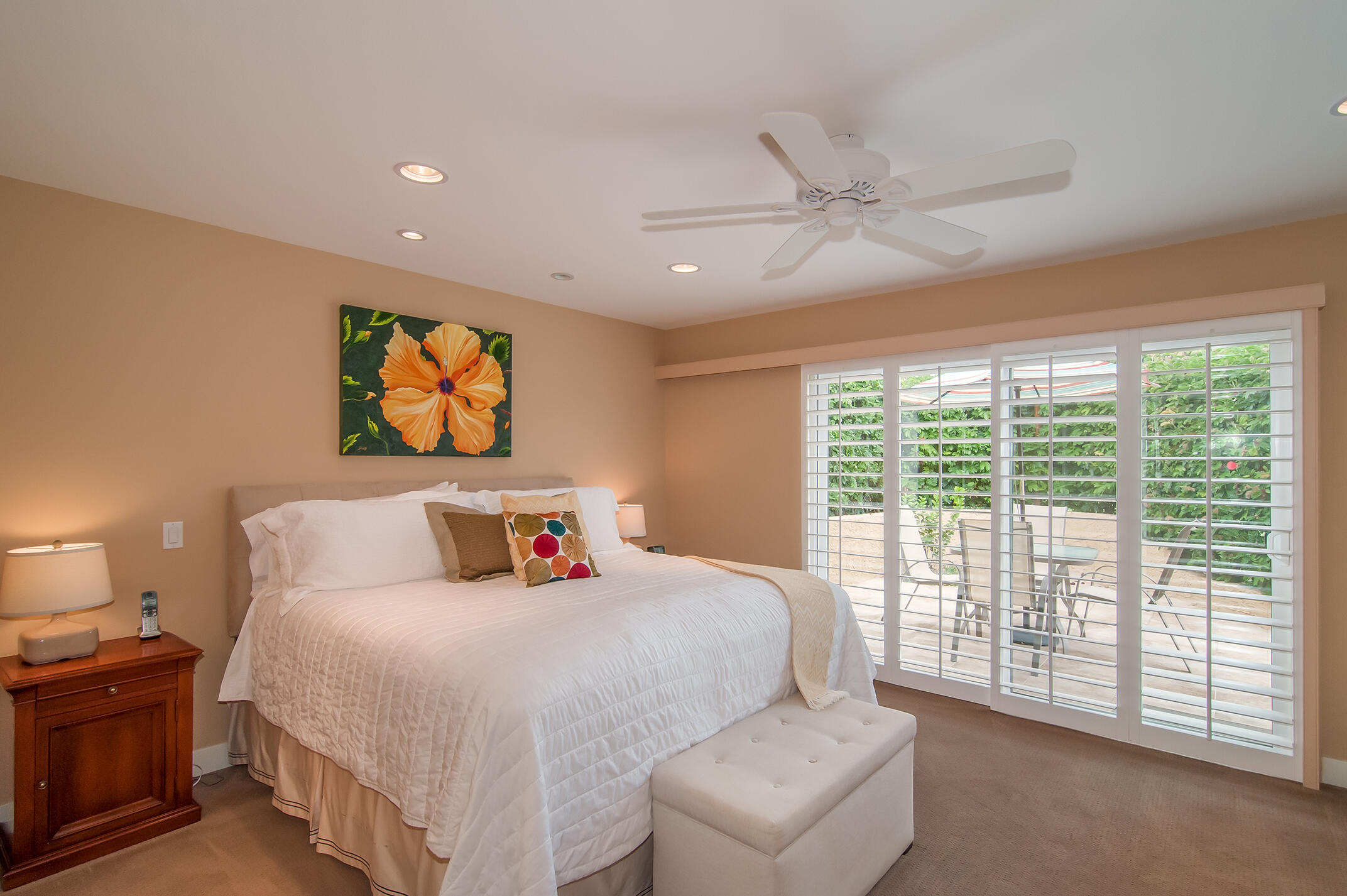 48275 Racquet Lane Palm Desert, CA 92260 - Photo 14 of 29 a bedroom with a bed and a large window