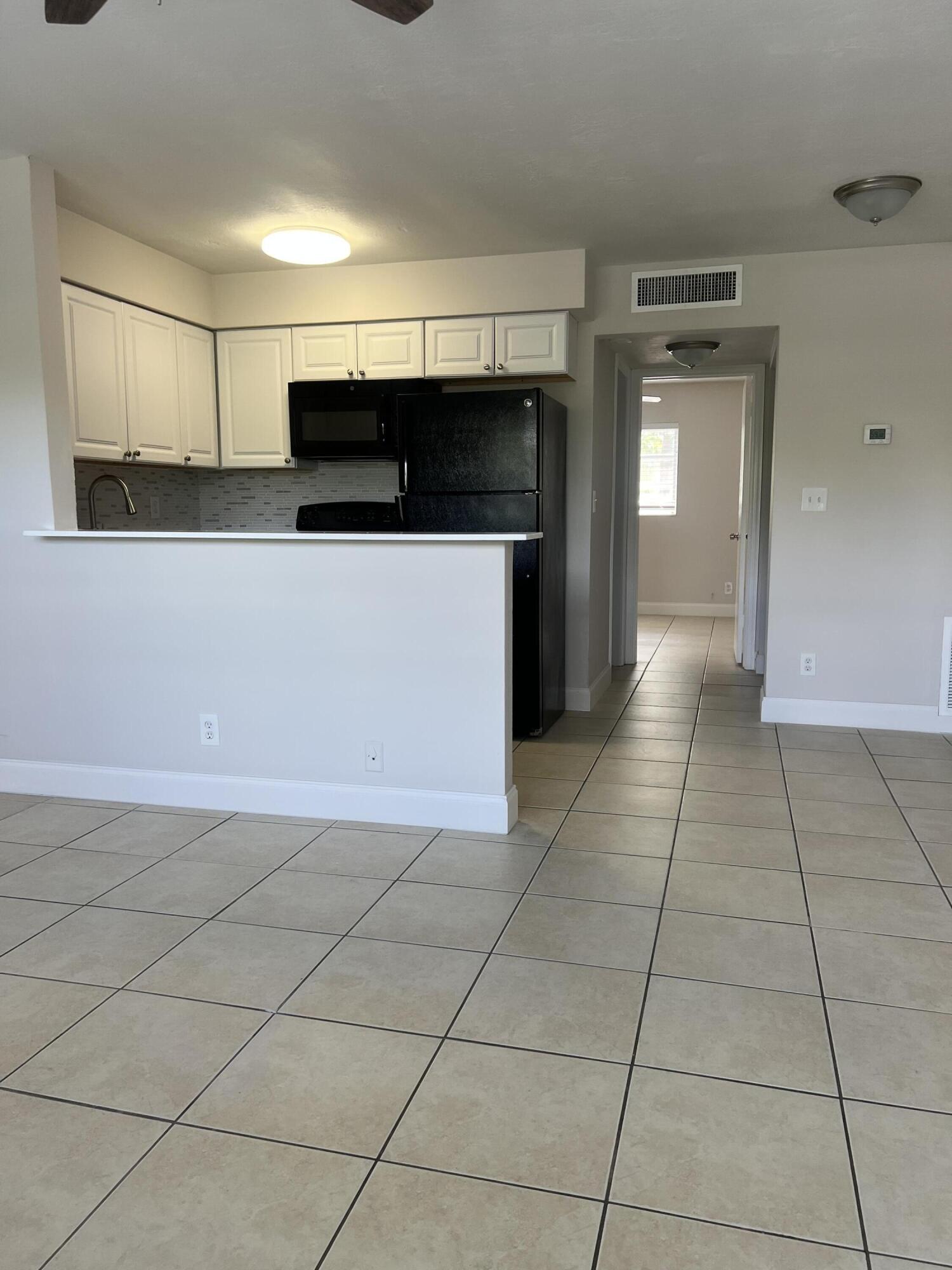 4670 Northeast 5th Avenue, Unit 5 Boca Raton, FL 33431 - Photo 3 of 8 IMG_6904