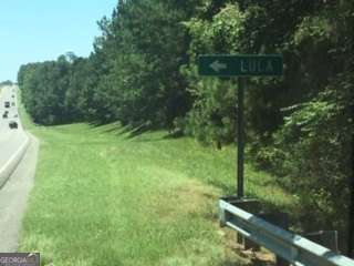 4737 Cornelia Highway Lula, GA 30554 - Photo 3 of 3 a view of a green yard