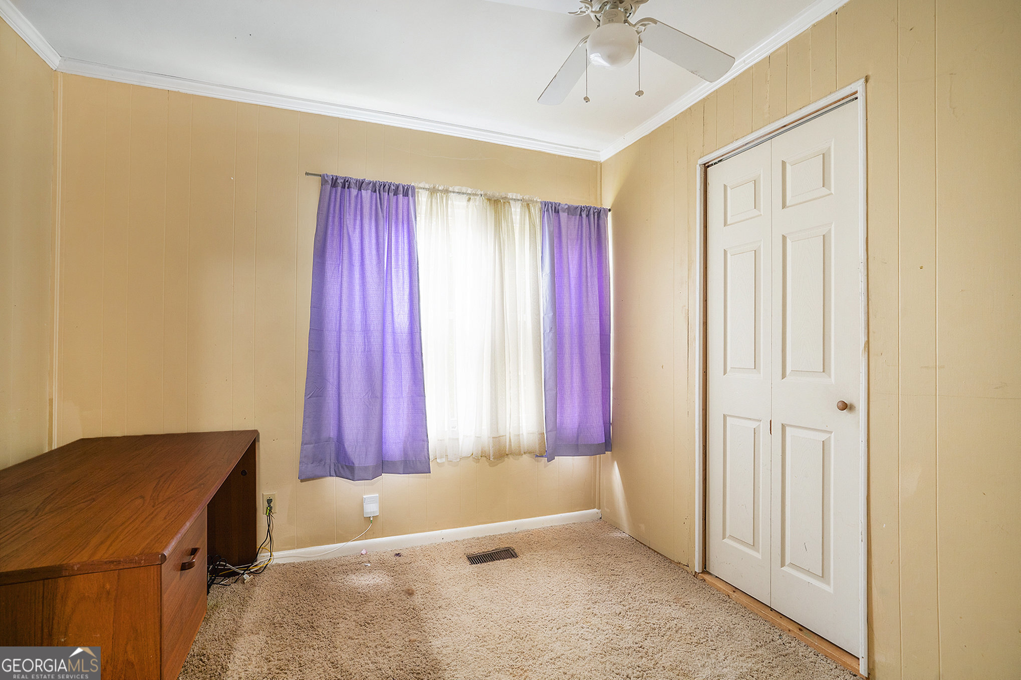 1083 Hampton Road Hampton, GA 30228 - Photo 11 of 27 a view of a room with a window and a projector