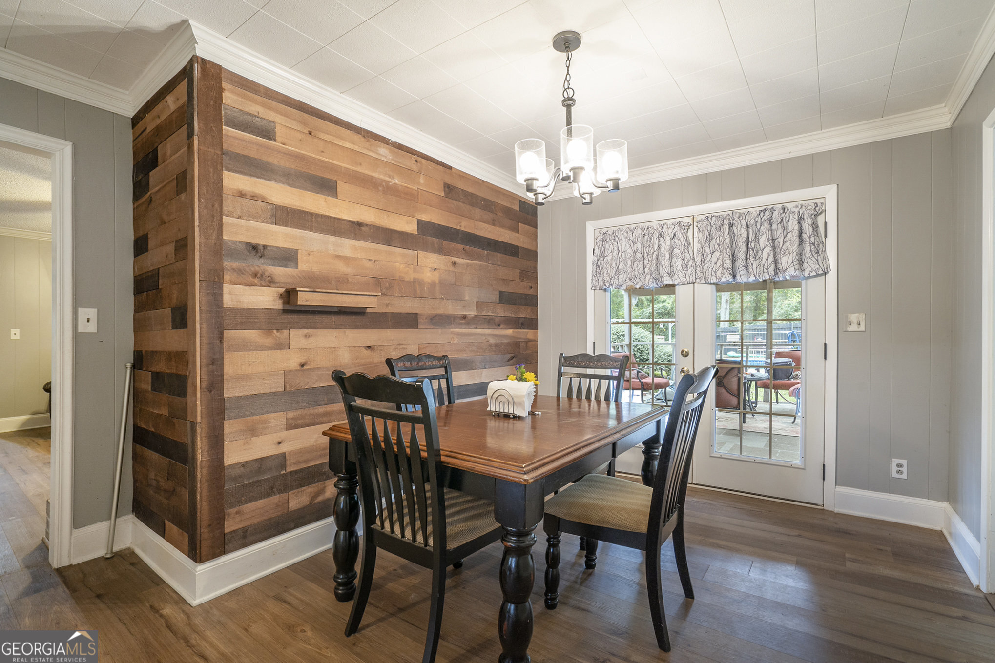1083 Hampton Road Hampton, GA 30228 - Photo 19 of 27 a view of a dining room with furniture window and wooden floor