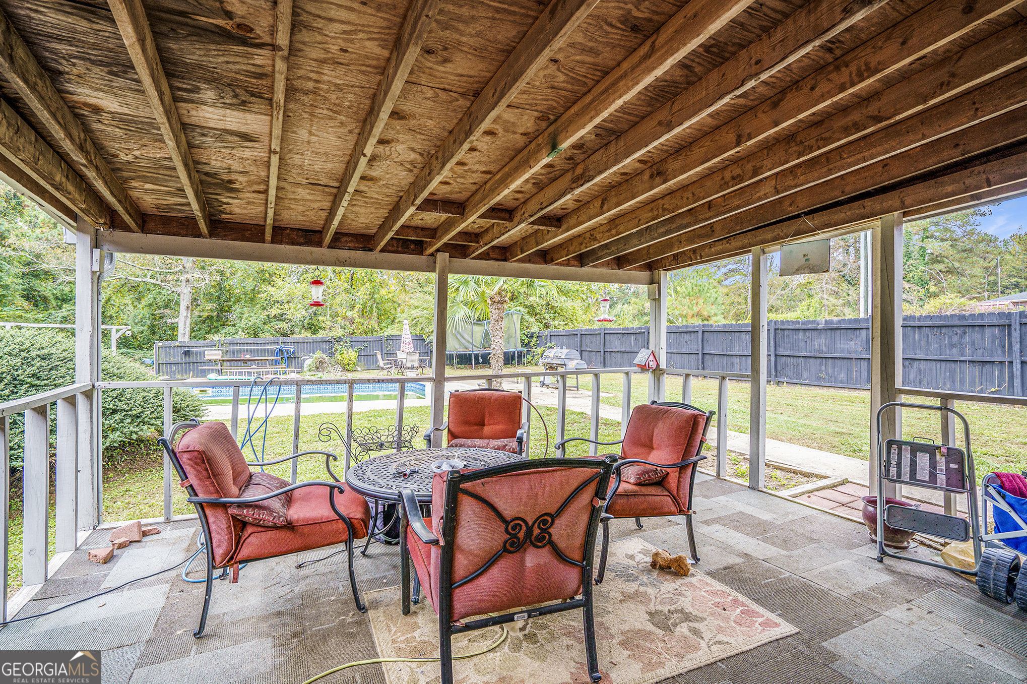 1083 Hampton Road Hampton, GA 30228 - Photo 4 of 27 a view of a swimming pool with a couple of chairs