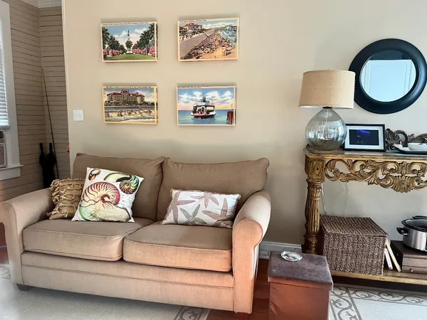 a bedroom with a bed and a television