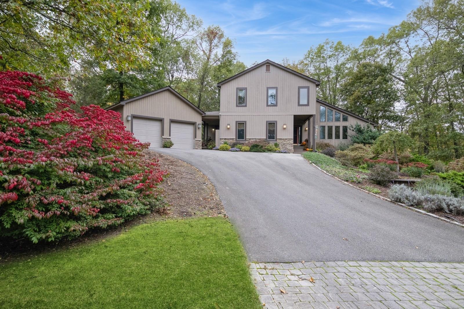 View of front of property nicely set back on the property on a cul-de-sac