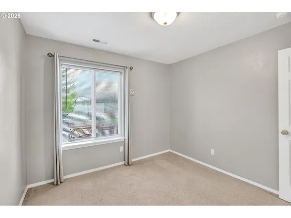 an empty room with a outdoor space