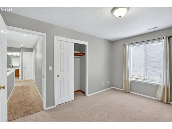 a view interior of a house with an empty space and windows