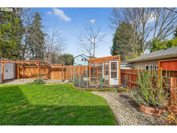 a front view of house with yard and outdoor seating