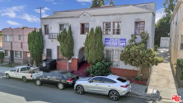 a car parked in front of a house