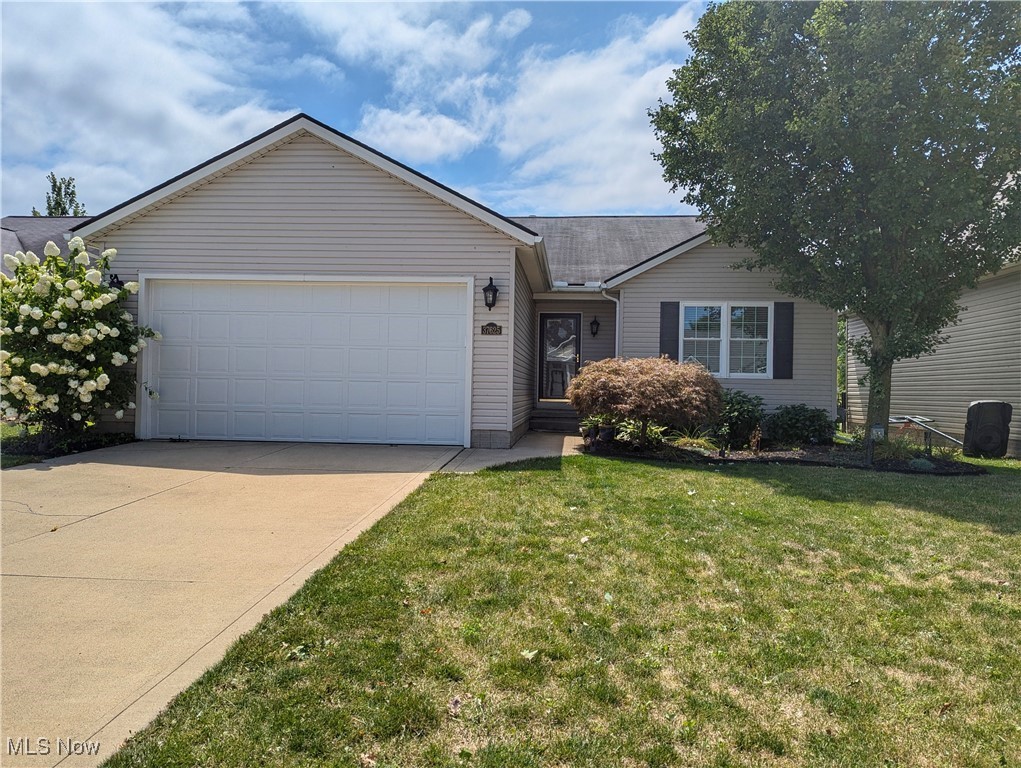 37625 Sandy Ridge Drive North Ridgeville, OH 44039 - Photo 1 of 44 Single story home featuring a garage and a front lawn
