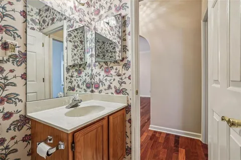 a bathroom with a sink and a mirror