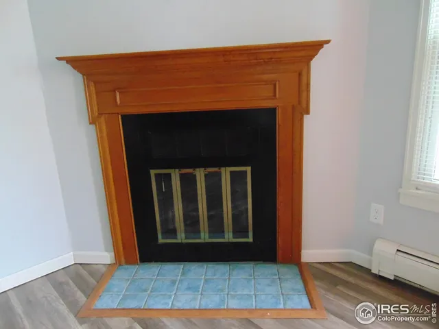 a kitchen with appliances cabinets and a window
