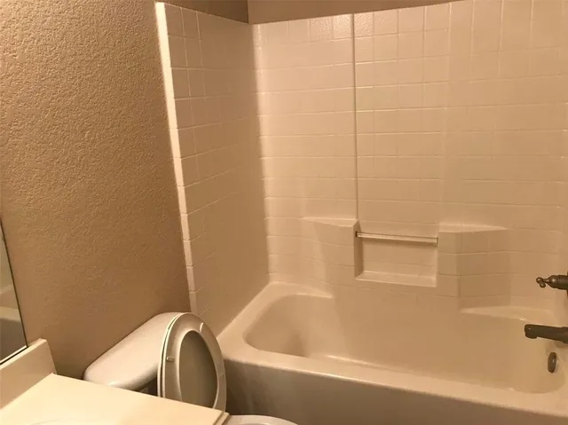 a bathroom with a bathtub