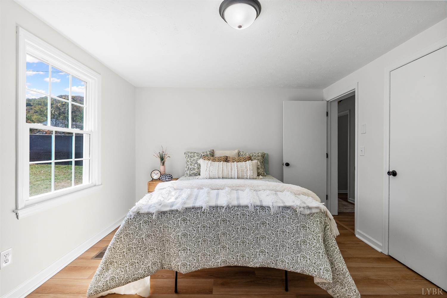 202 Ridgecrest Drive Monroe, VA 24574 - Photo 15 of 25 a bedroom with a bed and window
