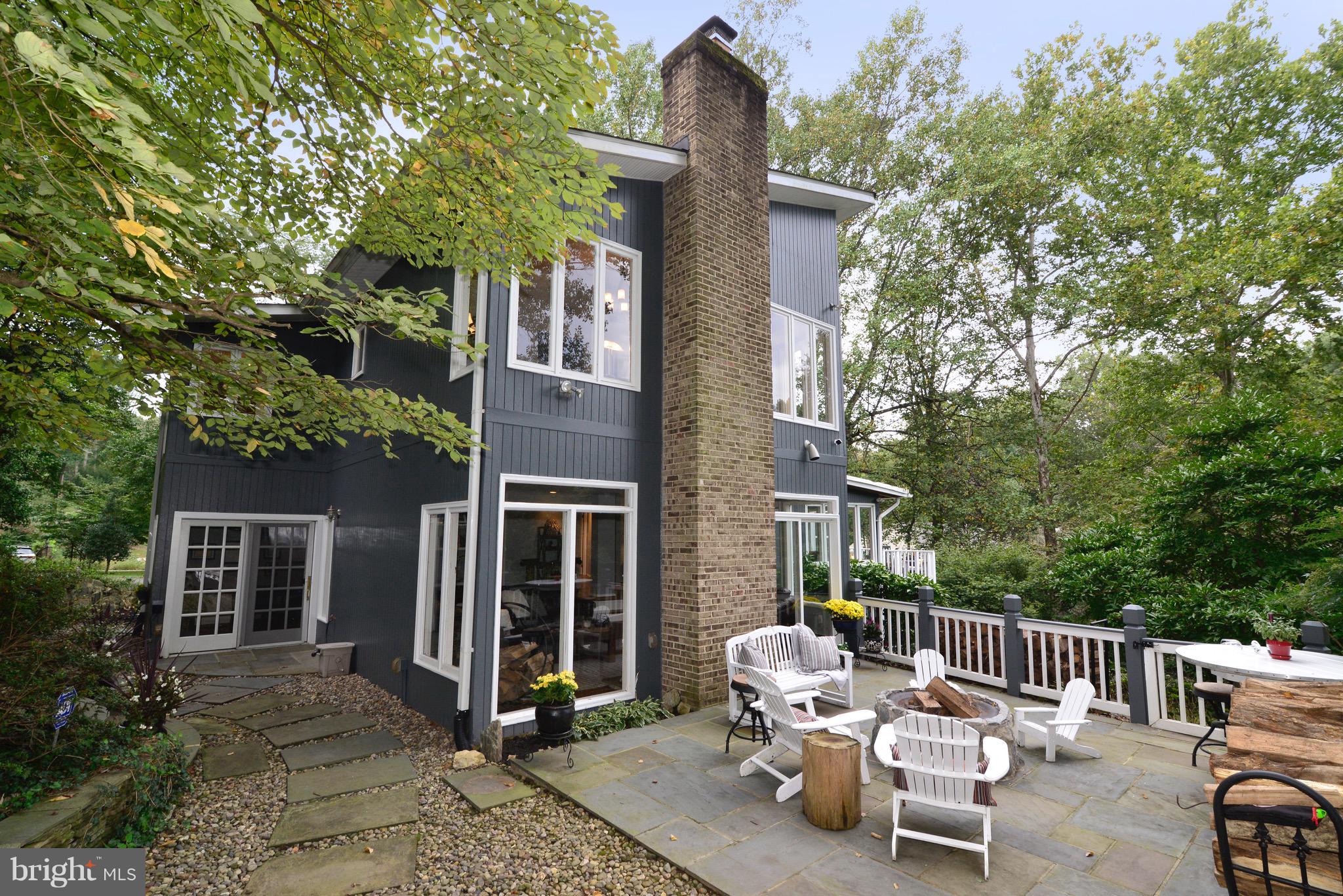 9944 Lawyers Road Vienna, VA 22181 - Photo 24 of 30 Side view of the Patio, fire-pit, rear of the home