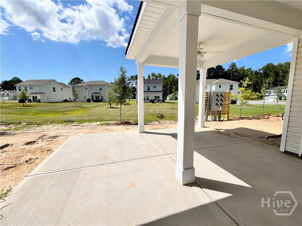 111 Pinebury Road Pooler, GA 31322 - Photo 17 of 22 Photo taken 7.3.26. HOME IS UNDER CONSTRUCTION. Expanded covered porch in back of home plus large concrete area - great for entertaining, relaxing and grilling!