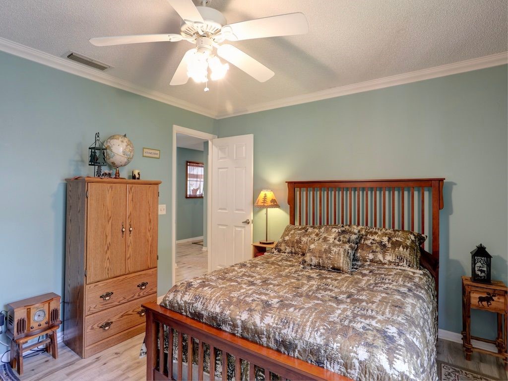 2150 Pine Creek Boulevard, Unit 202 Vero Beach, FL 32966 - Photo 21 of 31 a bed room with a bed