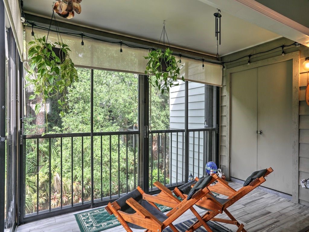2150 Pine Creek Boulevard, Unit 202 Vero Beach, FL 32966 - Photo 24 of 31 a balcony view with a potted plant and outdoor space