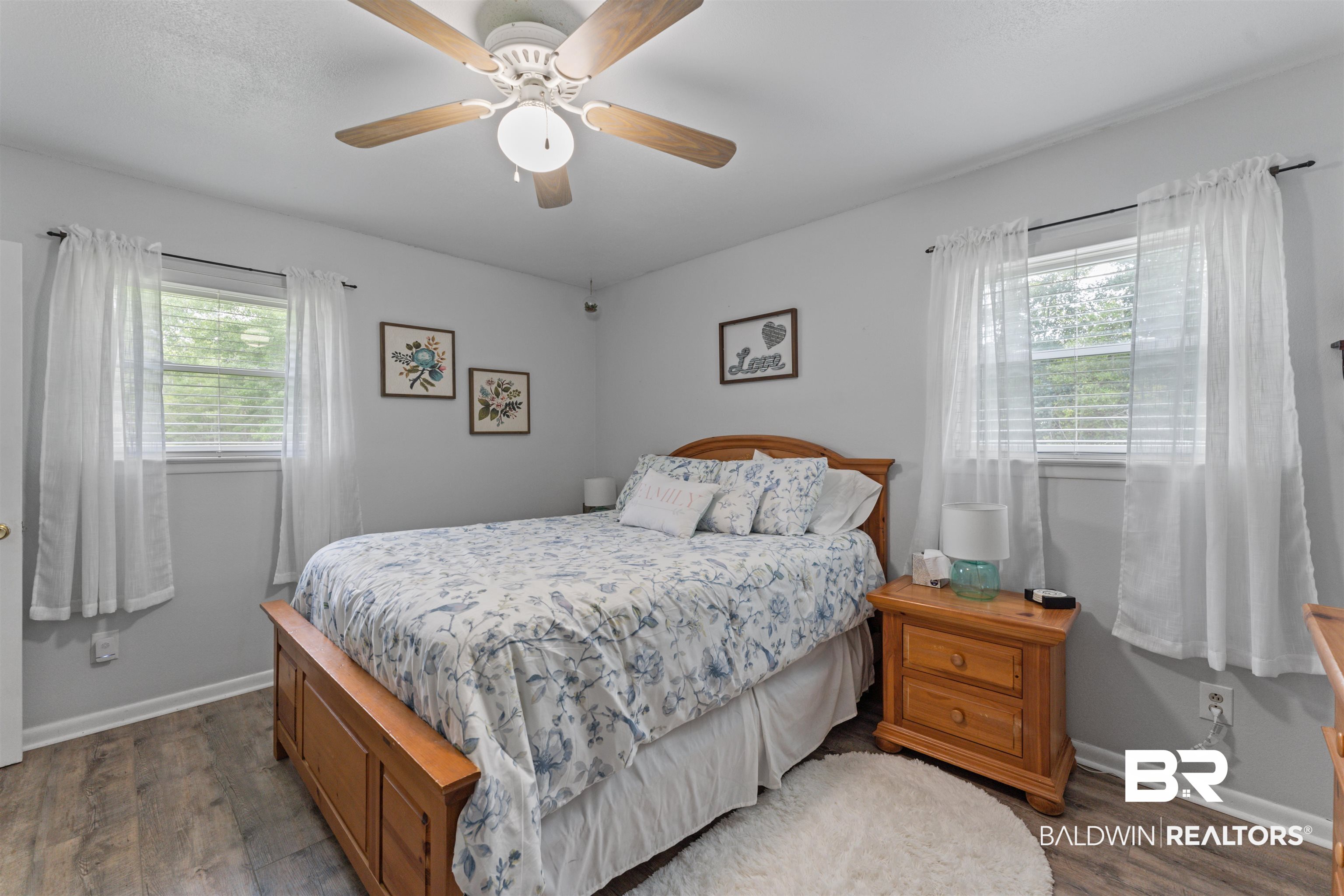 32794 Antietam Road Lillian, AL 36549 - Photo 12 of 20 Bedroom with wood finished floors and ceiling fan