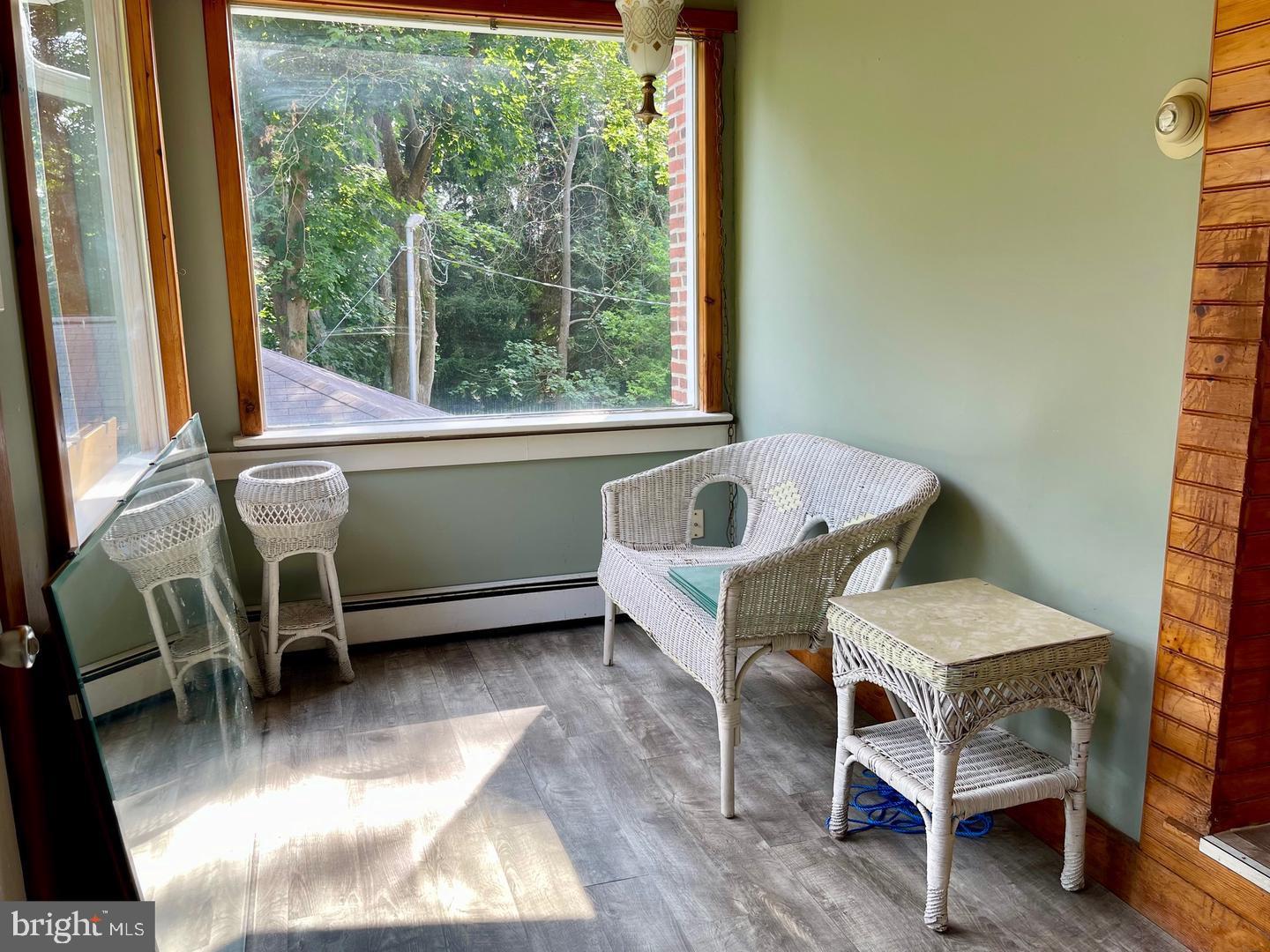 692 Lenni Road Aston, PA 19014 - Photo 10 of 28 a living room with a window and a table