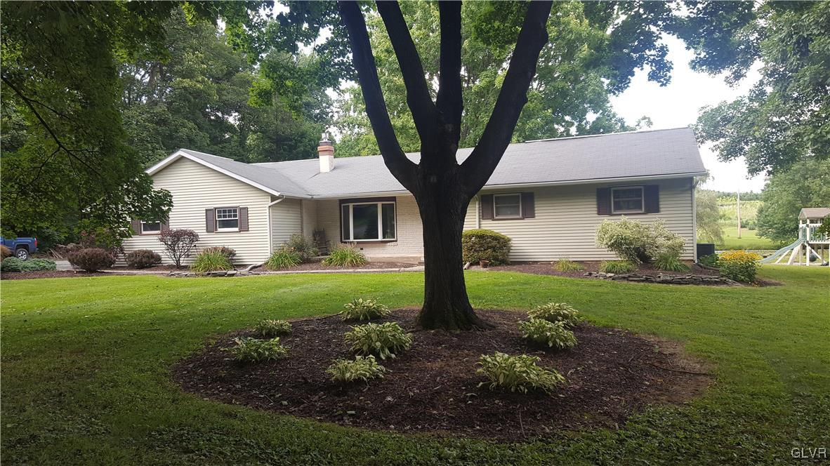 538 Bauer Road Bath, PA 18014 - Photo 1 of 25 a front view of house with yard and green space