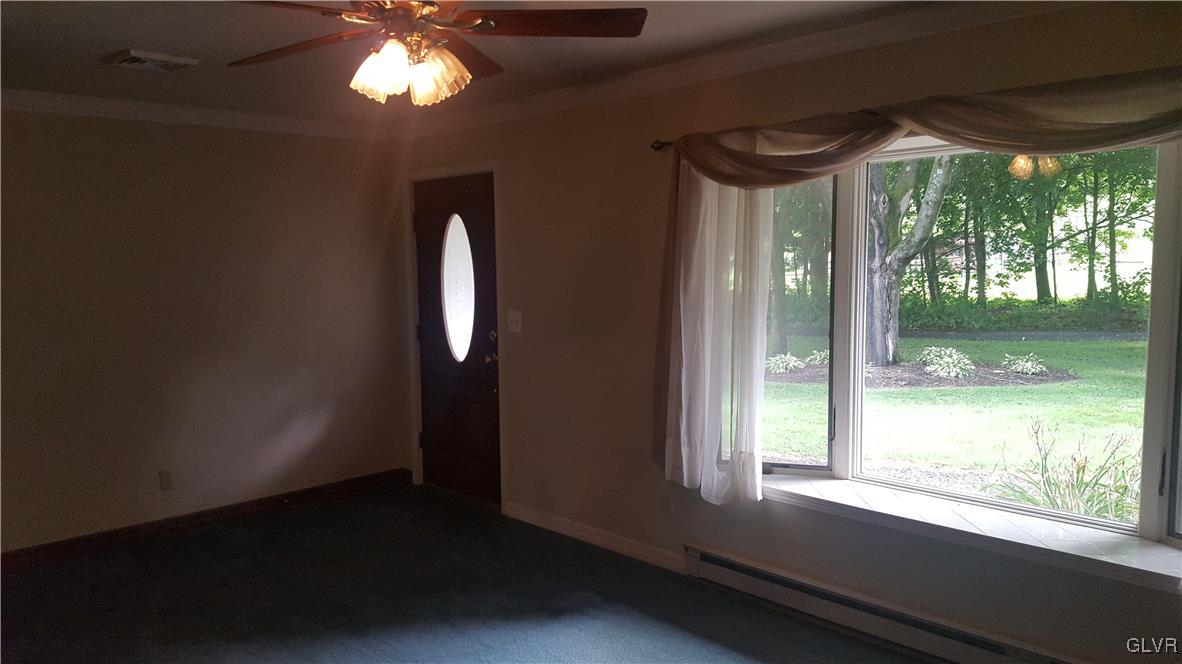 538 Bauer Road Bath, PA 18014 - Photo 15 of 25 a view of empty room with wooden floor and fan
