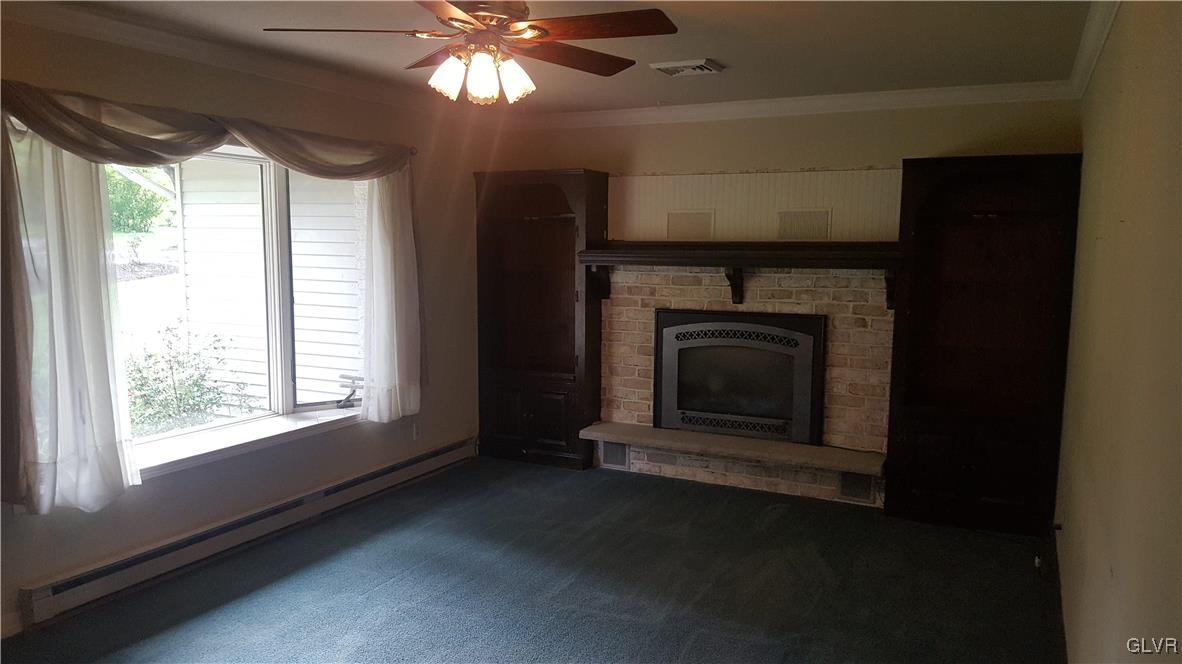 538 Bauer Road Bath, PA 18014 - Photo 16 of 25 a living room with a fireplace in it