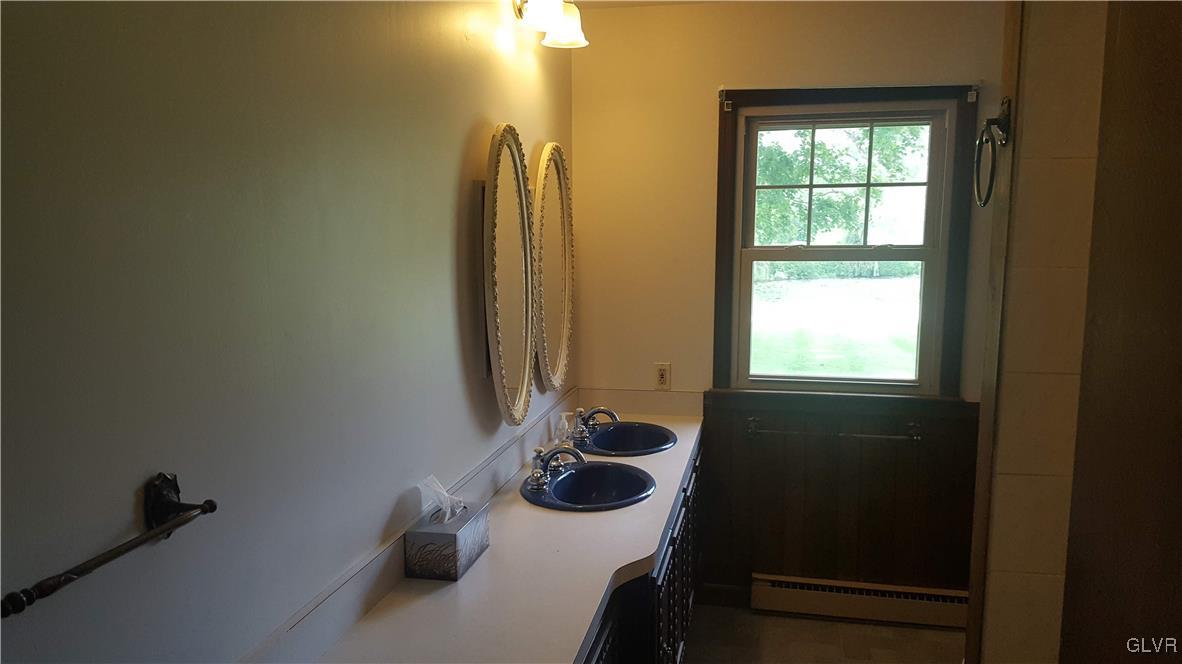 538 Bauer Road Bath, PA 18014 - Photo 24 of 25 a bathroom with a sink and a window