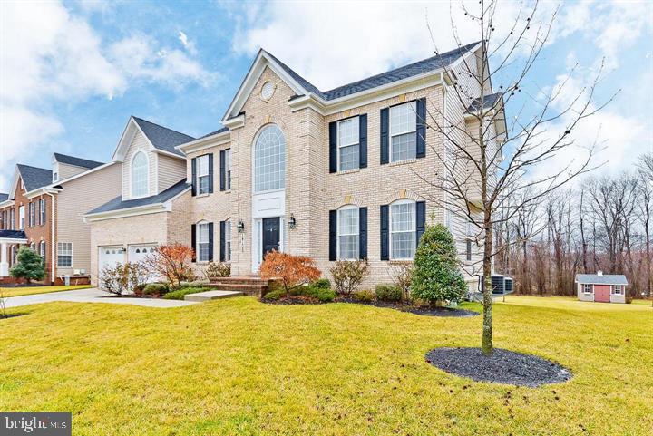 14108 Jones Bridge Road Upper Marlboro, MD 20774 - Photo 2 of 36 Elegant brick home with lush lawn.