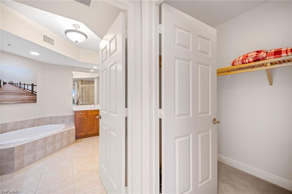 1065 Borghese Lane, Unit 203 Naples, FL 34114 - Photo 12 of 28 WALK IN CLOSET