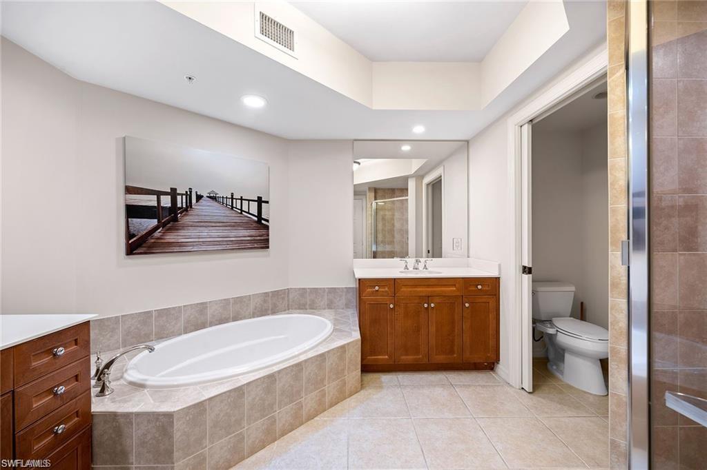1065 Borghese Lane, Unit 203 Naples, FL 34114 - Photo 13 of 28 Walk in Shower